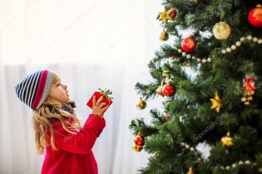 depositphotos_34890293-stock-photo-girl-near-christmas-tree-merry